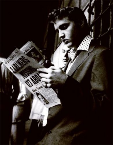 Elvis (Presley) Reading the Sunday Paper